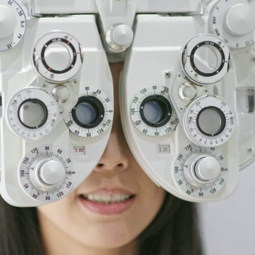 Young Woman checking on eye in clinic