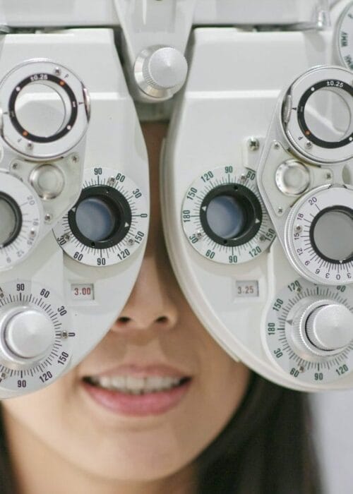 Young Woman checking on eye in clinic